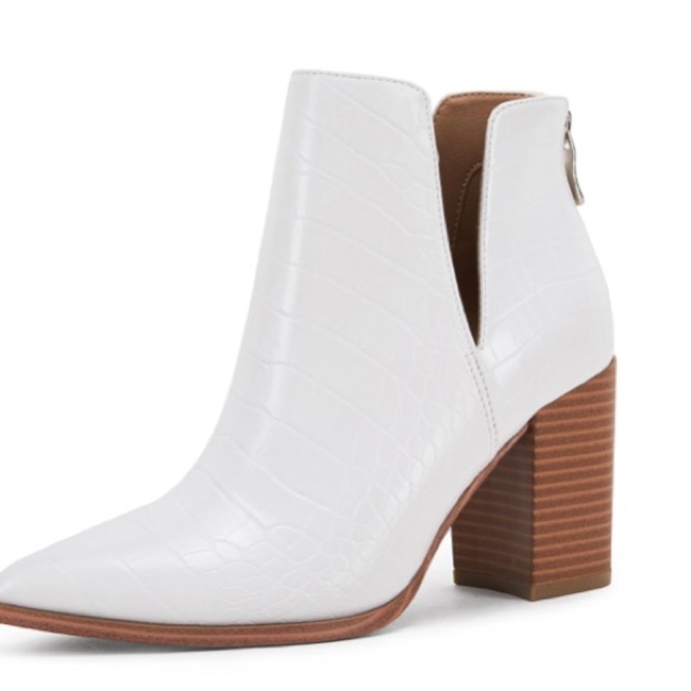 Woman’s stacked heel fake leather booties